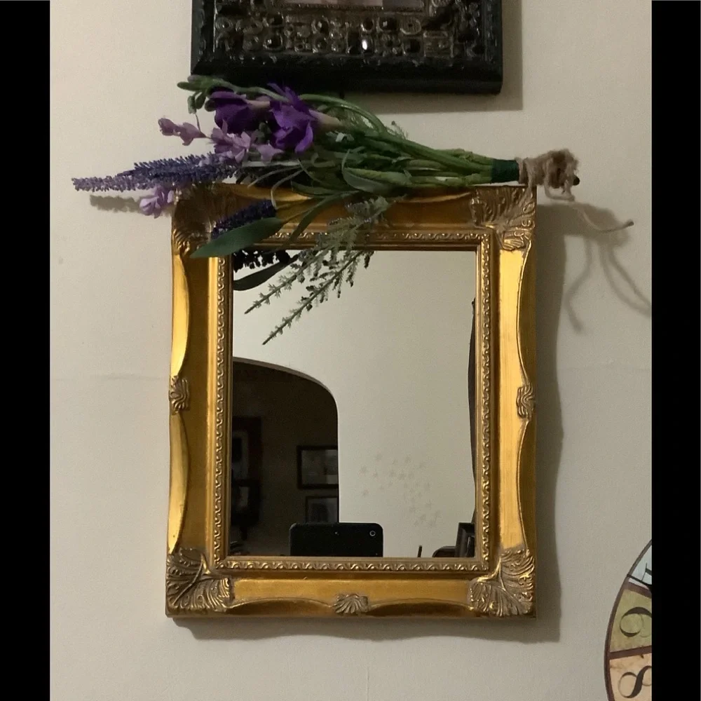 Ornate Gold Wall Mirror with Decorative Frame